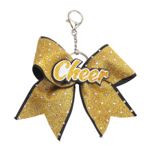 Schlüsselanhänger mit Cheerleader-Schleife – Stoff & Legierung, 11,5 cm