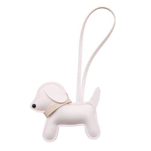 Chaveiro em formato de cachorro, feito de couro sintético resistente à água.