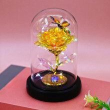 Rosa decorativa em folha metálica com cobertura de vidro e luz LED.