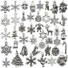 40 pendentifs flocons de neige en métal pour la création de bijoux d'hiver et de Noël – Compatibles avec les colliers et les bracelets