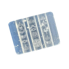 Molde de silicona flexible reutilizable con diseño de nudo chino, ideal para diseños de uñas y proyectos de manualidades con resina.