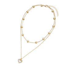 Collana moderna con ciondolo a cuore, collana a doppio strato con cuore cavo, gioiello da collo adatto agli appassionati di moda