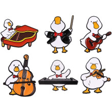 Conjunto de broches metálicos con forma de pato de 6Music