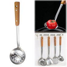 Kitchen Tools Set Featuring Spatulas Spoons Slotted And Other Sturdy Cooking Implements For Home And Restaurant Applications