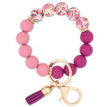 Conjunto de 2 chaveiros de silicone com contas, pulseira porta-chaves com pingente de margarida, perfeito para mulheres e meninas. O pacote inclui 2
