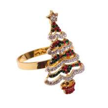 Porte-serviettes avec ronds de serviette en métal ornés de strass scintillants et d'un sapin de Noël finement travaillé - Accessoires de table