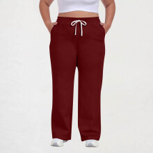 Calça feminina plus size casual com cintura ajustável por cordão, bolsos, cor sólida, modelagem esportiva e confortável.