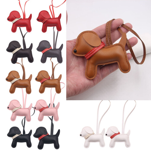 Chaveiro em formato de cachorro, feito de couro sintético resistente à água. 1