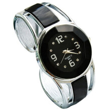 Orologio da polso Windcarnival da donna, modello analogico al quarzo con cassa rotonda e bracciale rigido, apertura frontale.