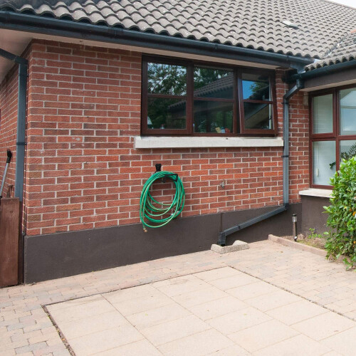 Black Steel Wall-Mounted Garden Hose Holder 1