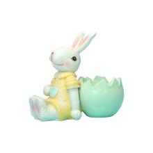 Paasdecoratie: keramisch konijn en ei, porseleinen beeldje van een leuk dier, decoratie voor de kinderkamer, verjaardagscadeau.