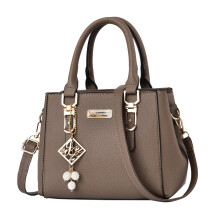 Bolsa feminina casual de couro, estilo carteiro, com grande capacidade e design moderno.