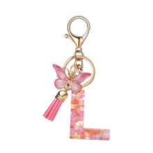 Porte-clés papillon à pompon avec pendentif 26 lettres
