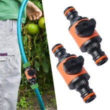 Adaptateur de tuyau d'arrosage avec vanne d'arrĂŞt en ligne et interrupteur rapide (2X), en plastique orange.