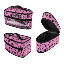 Sac de transport en polyester à imprimé léopard rose avec fermeture éclair lisse et facile à nettoyer. Usage domestique uniquement.