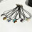 Collier pendentif croix en agate polyvalent avec cordon en cuir 3