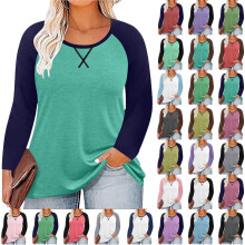 Top casual da donna taglie forti con maniche raglan, scollo rotondo e tinta unita.