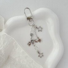 Pendentif élégant et détachable pour téléphone portable, orné d'une étoile et d'un nœud argentés (12 cm).