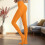 Women's semi-opaque footed tights orange L 1