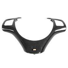 Garniture de volant en ABS imitation fibre de carbone avec adhésif, compatible avec les modèles BMW 325i, 330i et 335d (2005-2012). Apporte une