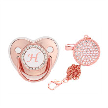 Ciuccio e clip per neonati e bambine Tao con strass, lettere scintillanti color oro rosa, giocattolo per la dentizione.