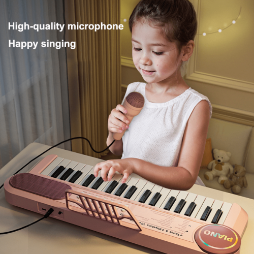 Pianoforte elettronico portatile con luce rossa e microfono, ideale per bambini. 1