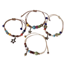 4-delige verstelbare armbanden in etnische stijl met dennenappel- en sterhangers, handgeweven kralenarmbanden voor casual gebruik.