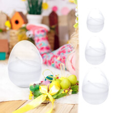 Draagbare, transparante, draaibare eierbewaardoos; een kleine open organizer voor Pasen en het verzamelen van kleine spullen.