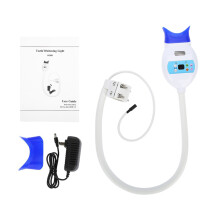 Krachtige LED-tandenbleeklamp met koud licht, ventilatorgekoelde bleekversneller, instelbare timer en halfronde kop.