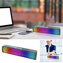 Barre de son Bluetooth avec caisson de basses puissant pour un son immersif, idéale pour un bureau ou un home cinéma. Design compact et