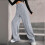 Pantaloni da jogging da donna a vita alta e gamba larga con elastico a coste 3