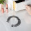 Pente de cabelo elástico preto com design de mola, delicado e flexível. 4