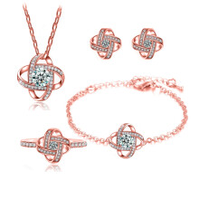 Ensemble de bijoux trèfle porte-bonheur en cuivre plaqué or serti de micro-pavés de zircon - 4 pièces : boucles d'oreilles, collier, bague