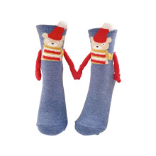 Calzini magnetici natalizi con mani che si stringono, ideali come regalo per bambini, donne e amiche, perfetti per decorazioni natalizie.
