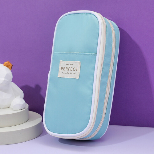 Macaron etui van canvas met grote inhoud, effen kleur.