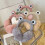Paraorecchie in pile a forma di rana 7