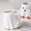 White Ceramic Mug with Ghost Cat & Bat Design 5