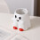 White Ceramic Mug with Ghost Cat & Bat Design 1