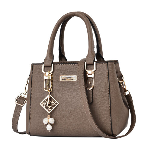 Bolsa transversal feminina em couro PU com zíper.