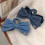 Blaue Haarspange mit dekorativen Schleifen 4