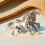 Broche vintage de metal con dos caballos corriendo 8