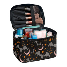 Cosmetica-organizertas met sterren- en vleermuispatroon, ritssluiting.