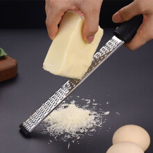 Stainless Steel Handheld Cheese Grater with Non-Slip Base for Kitchen and Household Use