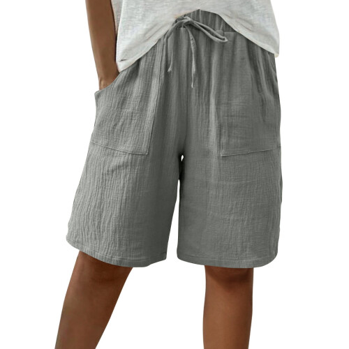 Løse dameshorts med elastisk talje og snøre, vide ben