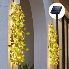 Guirnalda de luces solares decorativas para exteriores con diseño de hiedra artificial y cable de cobre.