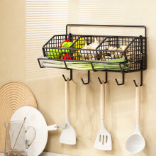Wall-Mounted Wire Mesh Basket for Organizing Fresh Ginger and Garlic in the Kitchen