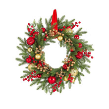 Guirlanda de Natal com pinheiros artificiais vermelhos e dourados com frutinhas.