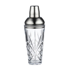 Coctelera de acero inoxidable con tapa y filtro: elegante utensilio de vidrio para mezclar cócteles artesanales.