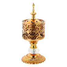 Quemador de incienso de metal dorado para el hogar con efecto de humo decorativo para crear un ambiente relajante.