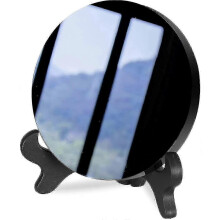 Natuurlijke obsidiaan waarzegspiegel voor Feng Shui en yoga energie met standaard, spirituele decoratie
